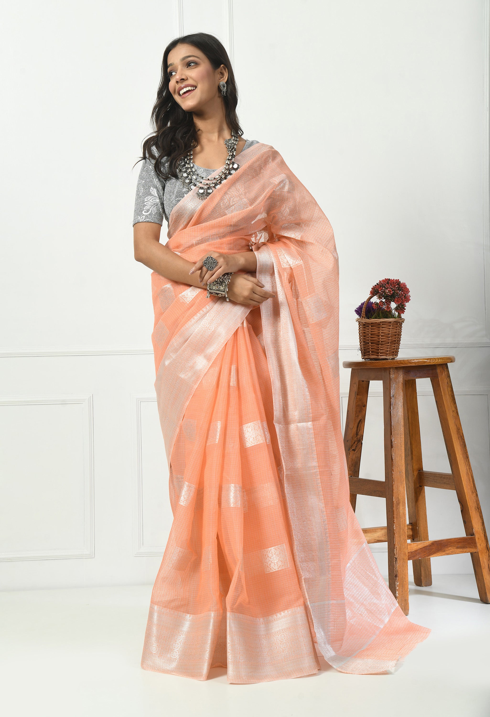 Peach Kota Doria with Silver Border Saree