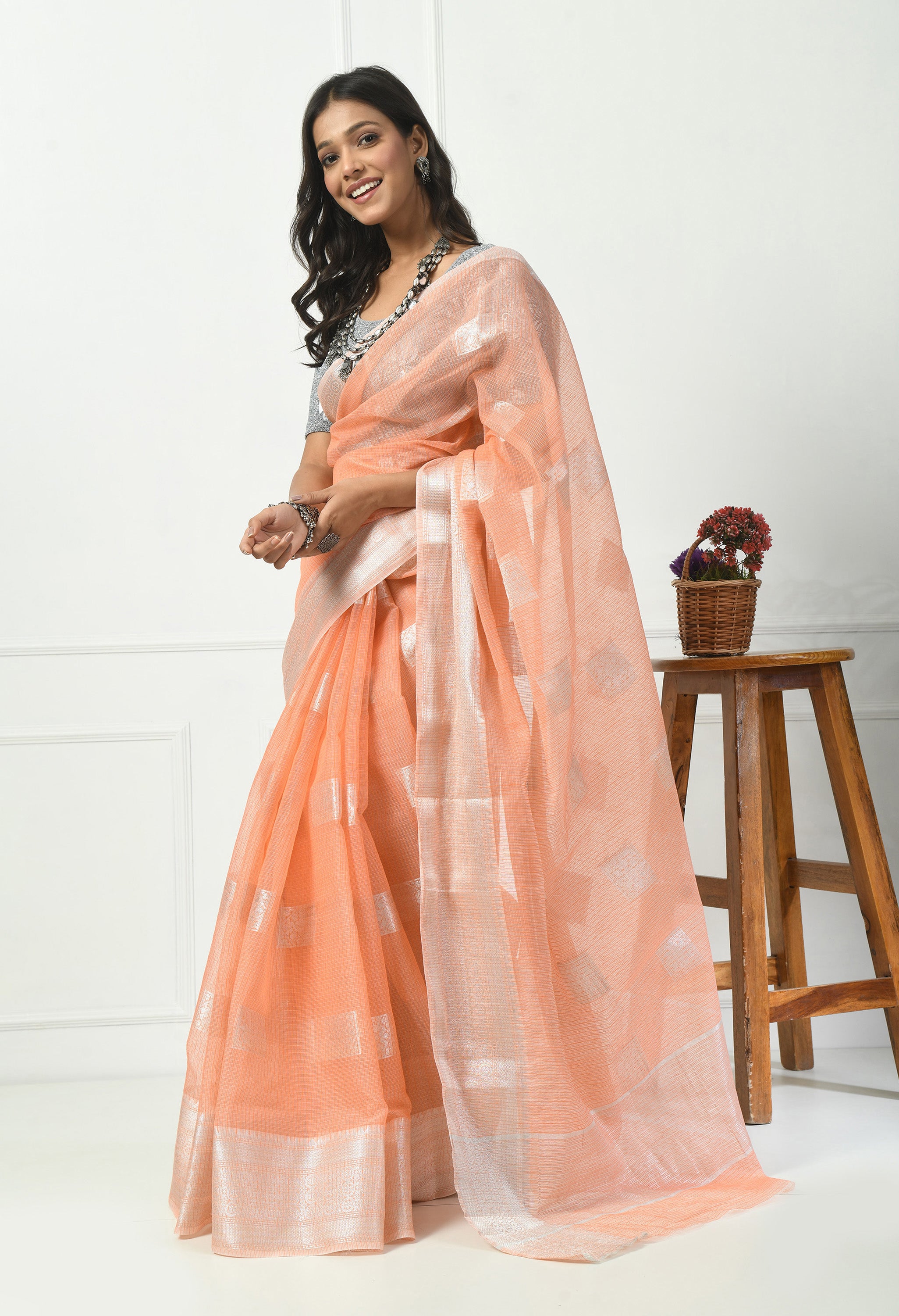 Peach Kota Doria with Silver Border Saree